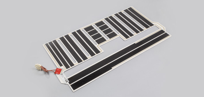 Polyester foil heater with large cut-out in the centre