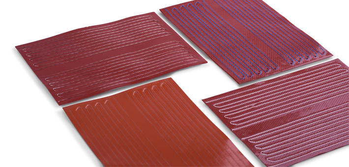Semi-finished silicone heaters with manually wound heating wire